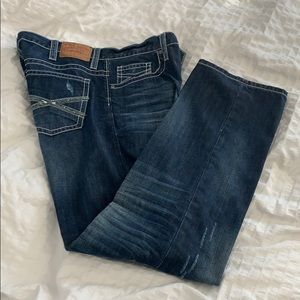 Stetson distressed denim jeans in white stitching.